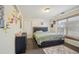 Inviting bedroom with a comfortable bed, stylish decor, and natural light from the window at 3800 Market Walk, Clarkston, GA 30021