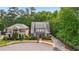 Charming two-story home with landscaped yard and inviting curb appeal on a tree-lined lot at 3800 Market Walk, Clarkston, GA 30021