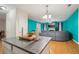 Open kitchen with island, stainless steel appliances, granite countertops, and hardwood floors at 3800 Market Walk, Clarkston, GA 30021