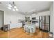Spacious kitchen with center island, stainless steel appliances, and hardwood flooring at 3800 Market Walk, Clarkston, GA 30021