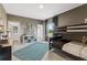 Cozy bedroom with bunk beds, a teal rug, and ample storage space at 727 Hedwig Dr, Mcdonough, GA 30252