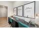 A shared workspace with inspirational art, dual desks and matching chairs at 727 Hedwig Dr, Mcdonough, GA 30252