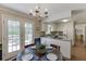 View of dining area, kitchen, and deck at 900 Meadowsong Cir, Lawrenceville, GA 30043