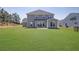 Expansive backyard with lush green lawn, ideal for outdoor activities and entertaining at 307 Ernest Ave, Peachtree City, GA 30269