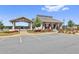 Elegant clubhouse with covered seating and well-manicured landscaping, a great community space at 307 Ernest Ave, Peachtree City, GA 30269