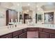 Bright bathroom with a large mirror, dual sinks, and a neutral-colored countertop at 3777 Peachtree Ne Rd # 1512, Brookhaven, GA 30319