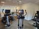 Bright community exercise room featuring cardio machines, elliptical cross trainers, and stationary bikes at 3777 Peachtree Ne Rd # 1512, Brookhaven, GA 30319