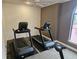 Community fitness center featuring two treadmills and a stationary bicycle for residents to use at 3777 Peachtree Ne Rd # 1512, Brookhaven, GA 30319