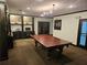 Game room with a pool table, desk, computer and comfortable seating at 3777 Peachtree Ne Rd # 1512, Brookhaven, GA 30319