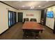Game room equipped with a pool table, seating, and large TV for entertainment at 3777 Peachtree Ne Rd # 1512, Brookhaven, GA 30319