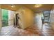 Hallway featuring tile floors and entry to unit and stairs to upper level at 3777 Peachtree Ne Rd # 1512, Brookhaven, GA 30319