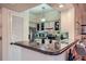 Bright kitchen featuring granite countertops and stainless steel appliances with an open floor plan at 3777 Peachtree Ne Rd # 1512, Brookhaven, GA 30319