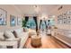 Spacious living room with hardwood floors, natural light, and stylish furniture at 3777 Peachtree Ne Rd # 1512, Brookhaven, GA 30319
