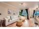 Well-decorated living room with a comfortable sofa, and ample natural light at 3777 Peachtree Ne Rd # 1512, Brookhaven, GA 30319