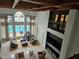 Spacious living room with high ceilings, a chandelier, and view of the pool at 3777 Peachtree Ne Rd # 1512, Brookhaven, GA 30319