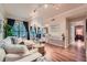 Open-concept living room featuring hardwood floors, and access to dining area at 3777 Peachtree Ne Rd # 1512, Brookhaven, GA 30319