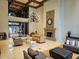 Bright lobby featuring a grand chandelier, fireplace, and comfortable seating at 3777 Peachtree Ne Rd # 1512, Brookhaven, GA 30319