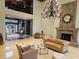 Bright lobby featuring a grand chandelier, fireplace, and comfortable seating at 3777 Peachtree Ne Rd # 1512, Brookhaven, GA 30319
