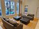 Lobby with comfortable sofas, large windows with a pool view, and a cozy rug at 3777 Peachtree Ne Rd # 1512, Brookhaven, GA 30319