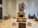 Expansive lobby with a decorative fireplace, elegant chandelier, and comfortable seating arrangement at 3777 Peachtree Ne Rd # 1512, Brookhaven, GA 30319