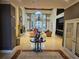 Elegant lobby with high ceilings, chandelier, fireplace, and comfortable seating area at 3777 Peachtree Ne Rd # 1512, Brookhaven, GA 30319