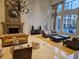 Bright, open living area with fireplace, large windows, and cozy seating for relaxation at 3777 Peachtree Ne Rd # 1512, Brookhaven, GA 30319