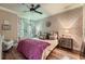 Comfortable main bedroom with hardwood floors, ample natural light, and stylish decor at 3777 Peachtree Ne Rd # 1512, Brookhaven, GA 30319