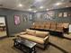 This theater room offers tiered seating and is ready for entertaining guests at 3777 Peachtree Ne Rd # 1512, Brookhaven, GA 30319