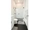 Modern bathroom features a glass shower, white subway tile, and black tile floor at 3790 Andover St, Cumming, GA 30028
