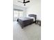 This is a bedroom featuring gray carpet, a ceiling fan, natural light, and soft, neutral colors at 3790 Andover St, Cumming, GA 30028