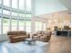 Open concept living room with cathedral ceiling flows into a modern kitchen at 3790 Andover St, Cumming, GA 30028