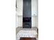 Living room features a soaring fireplace, television, and large windows at 3790 Andover St, Cumming, GA 30028