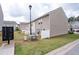 Exterior view of townhomes with manicured lawn and mailbox structure at 406 Crescent Woode Dr, Dallas, GA 30157
