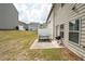 Backyard featuring a patio with a picnic table and a grill at 406 Crescent Woode Dr, Dallas, GA 30157