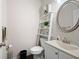 Charming half bathroom with decorative ladder shelf and updated fixtures at 406 Crescent Woode Dr, Dallas, GA 30157