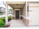 Inviting front entrance with stone accents and a covered porch area at 406 Crescent Woode Dr, Dallas, GA 30157