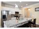 Modern kitchen featuring granite countertops, stainless steel appliances, and white cabinetry at 406 Crescent Woode Dr, Dallas, GA 30157