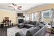 Cozy living room with a fireplace and plush sofa seating at 406 Crescent Woode Dr, Dallas, GA 30157