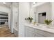 A full bath with an overhead shower features an adjacent bedroom view at 732 Hedwig Dr, Mcdonough, GA 30252