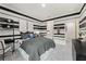 Striking bedroom featuring sporty black and white horizontal stripes and neutral gray accents at 732 Hedwig Dr, Mcdonough, GA 30252