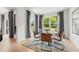 Cozy breakfast nook with large windows providing natural light and backyard views at 732 Hedwig Dr, Mcdonough, GA 30252