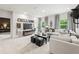 Open concept living room featuring a cozy seating area and modern decor at 732 Hedwig Dr, Mcdonough, GA 30252