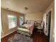Bright bedroom with plush bed, desk, and large windows for natural light at 10650 Allon Cv # 137, Alpharetta, GA 30022