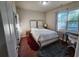 Comfortable bedroom with natural light and a desk area, perfect for relaxing or working at 10650 Allon Cv # 137, Alpharetta, GA 30022