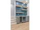 Chic bar area featuring floating shelves and a wine fridge at 293 Ormond Se St, Atlanta, GA 30315