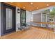 Inviting covered porch with stylish seating at 293 Ormond Se St, Atlanta, GA 30315