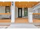 Inviting covered porch with stylish seating and wood ceiling at 293 Ormond Se St, Atlanta, GA 30315