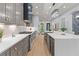Well-appointed kitchen boasts stainless steel appliances and ample counter space at 293 Ormond Se St, Atlanta, GA 30315