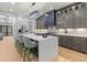 Gourmet kitchen features large island, stainless appliances and gray cabinets at 293 Ormond Se St, Atlanta, GA 30315