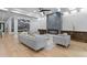 Spacious living room features modern fireplace and comfortable seating with views to dining area at 293 Ormond Se St, Atlanta, GA 30315